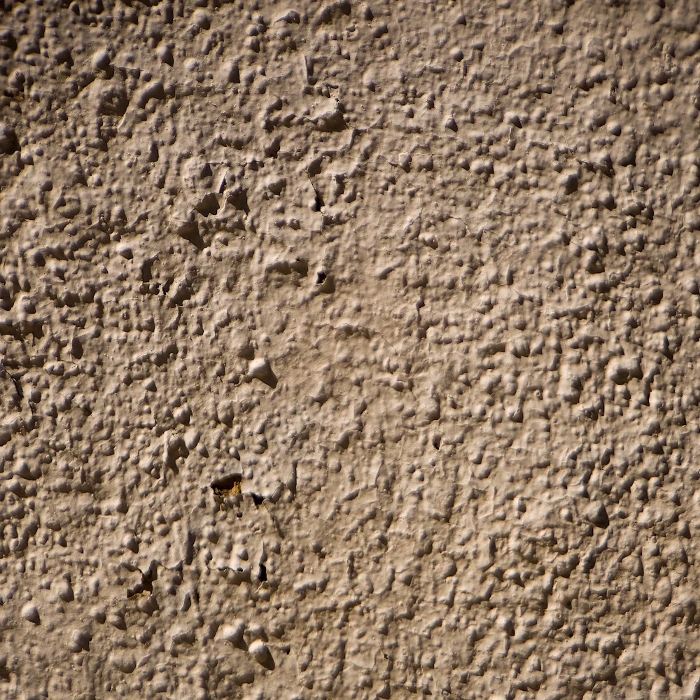 Textured exterior render wall coating